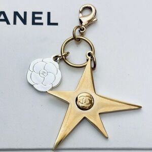 CHANEL Holiday 2025 Gold Star and Silver Camellia Key Chain